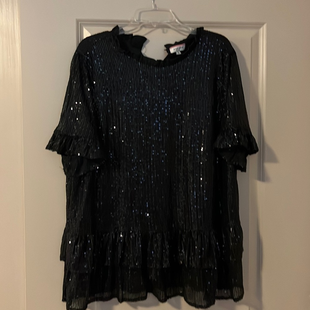 Sequin top with ruffle details